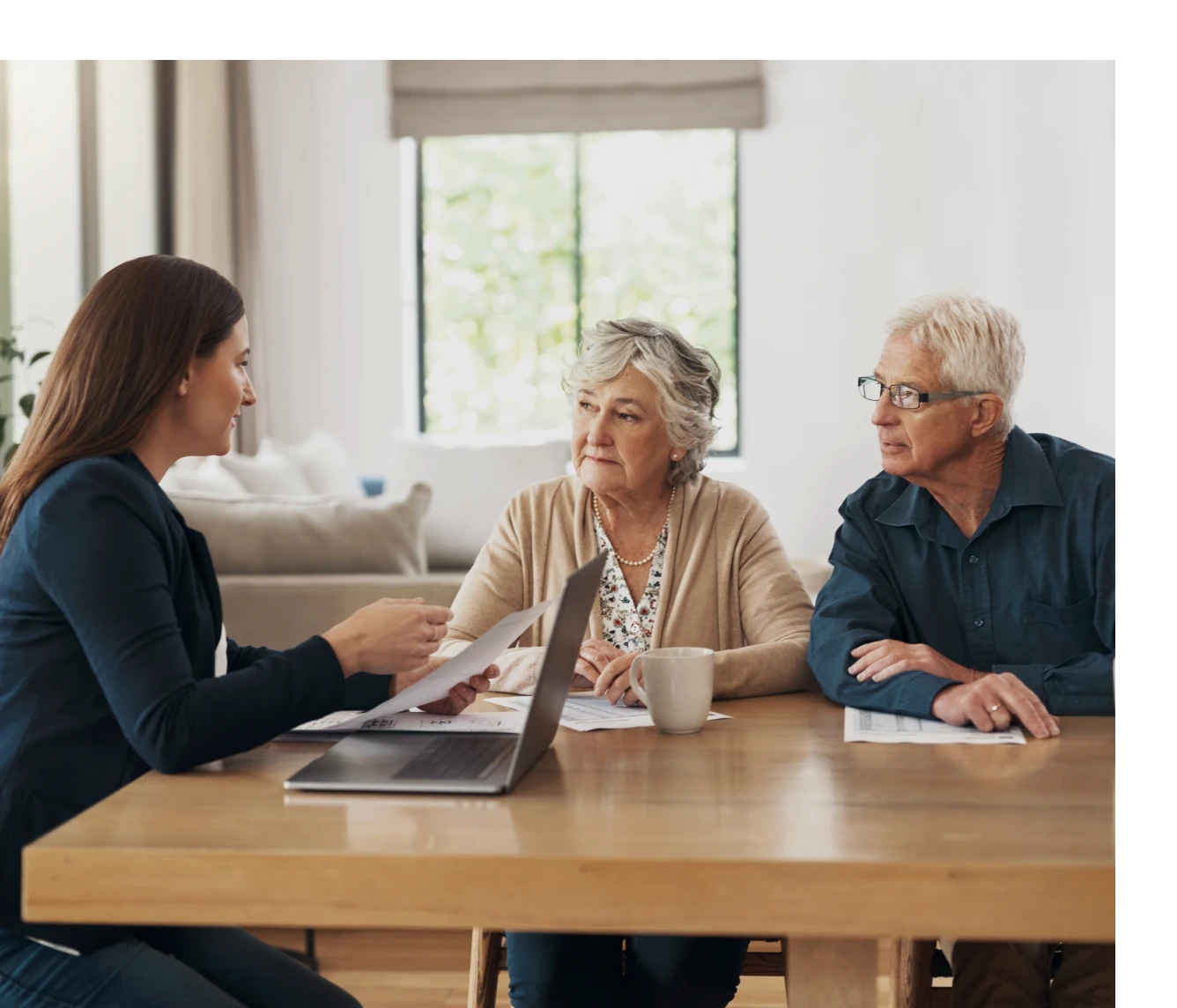 Elderly couple consulting with professional